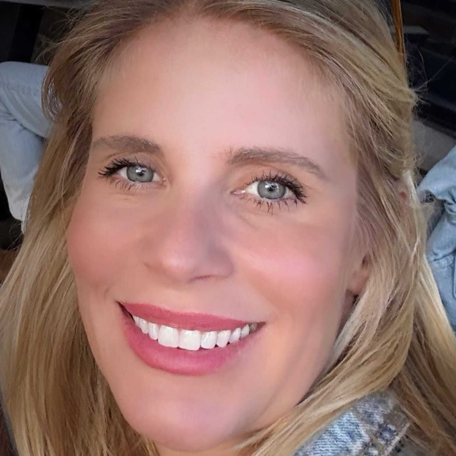 Portrait of Wendy Bensman, a professional stylist at Q Salon & Spa, showcasing their expertise and style.