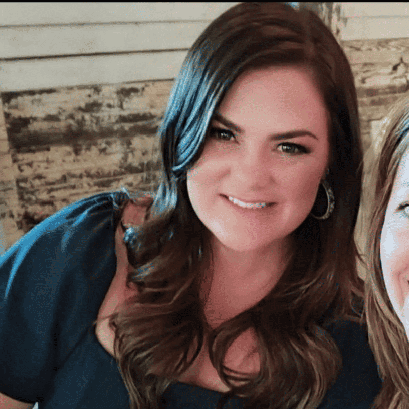 Portrait of Amanda Fithian, a professional stylist at Q Salon & Spa, showcasing their expertise and style.