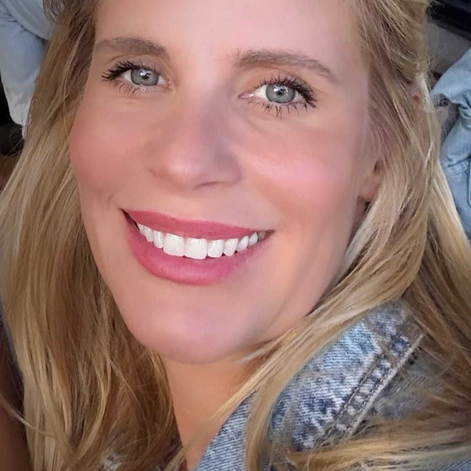 Portrait of Wendy Bensman, a professional stylist at Q Salon & Spa, showcasing their expertise and style.